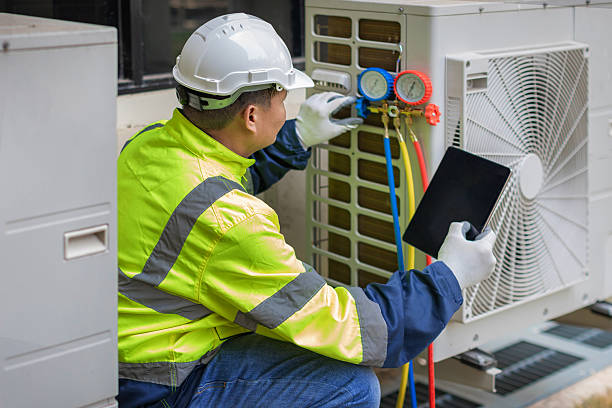 Professional Heat Pump Repair technician working in Latham, NY